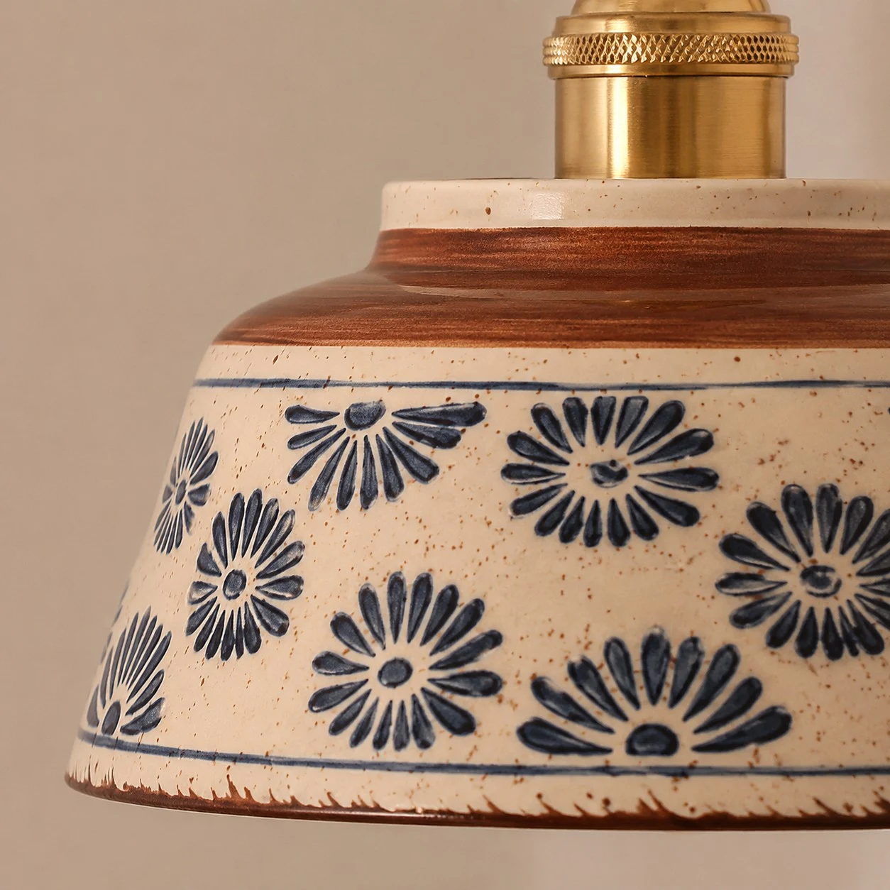 detail - ceramic rim and floral pattern